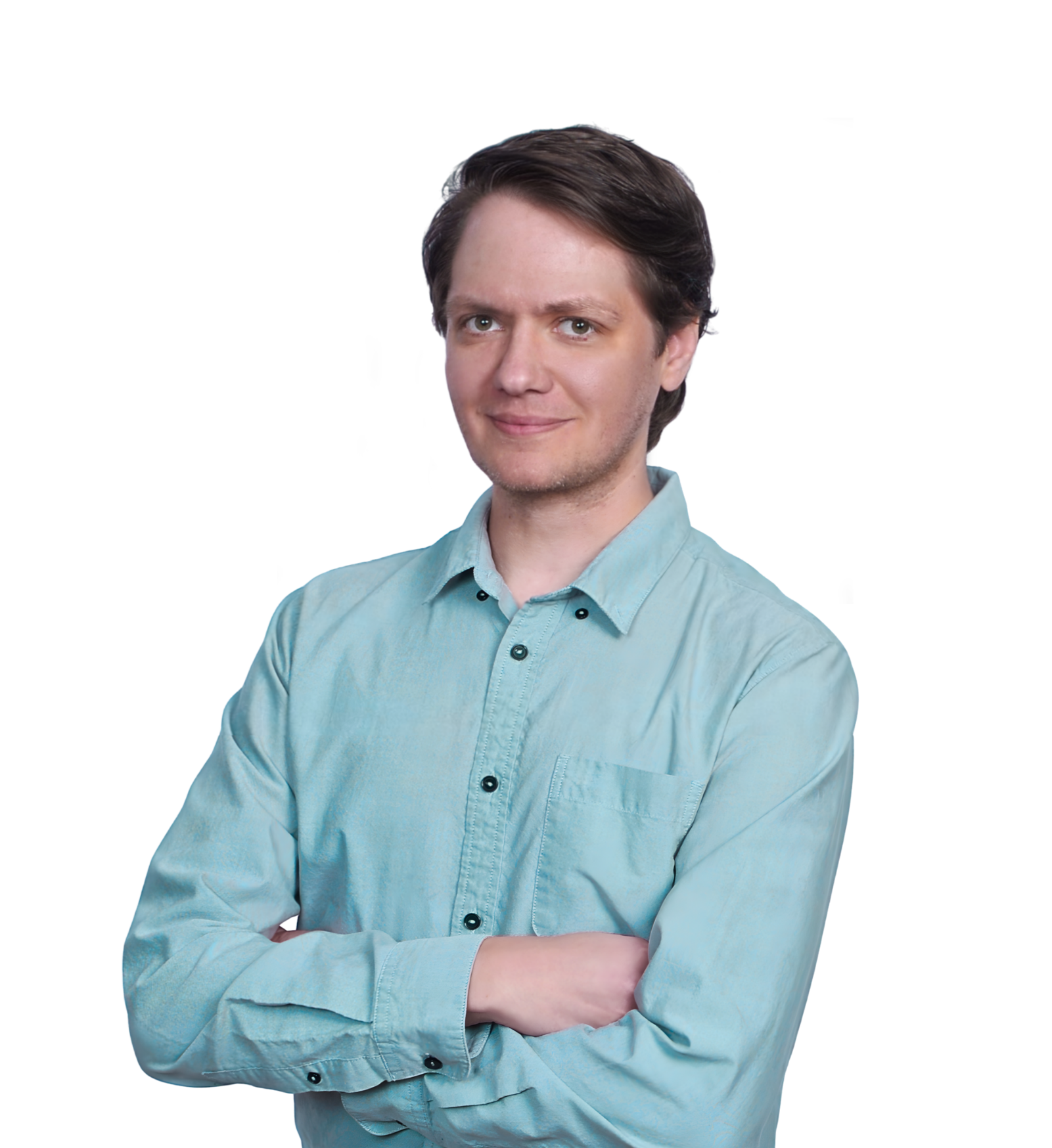 a man in a teal-colored button down shirt. His arms are folded and he's smiling.