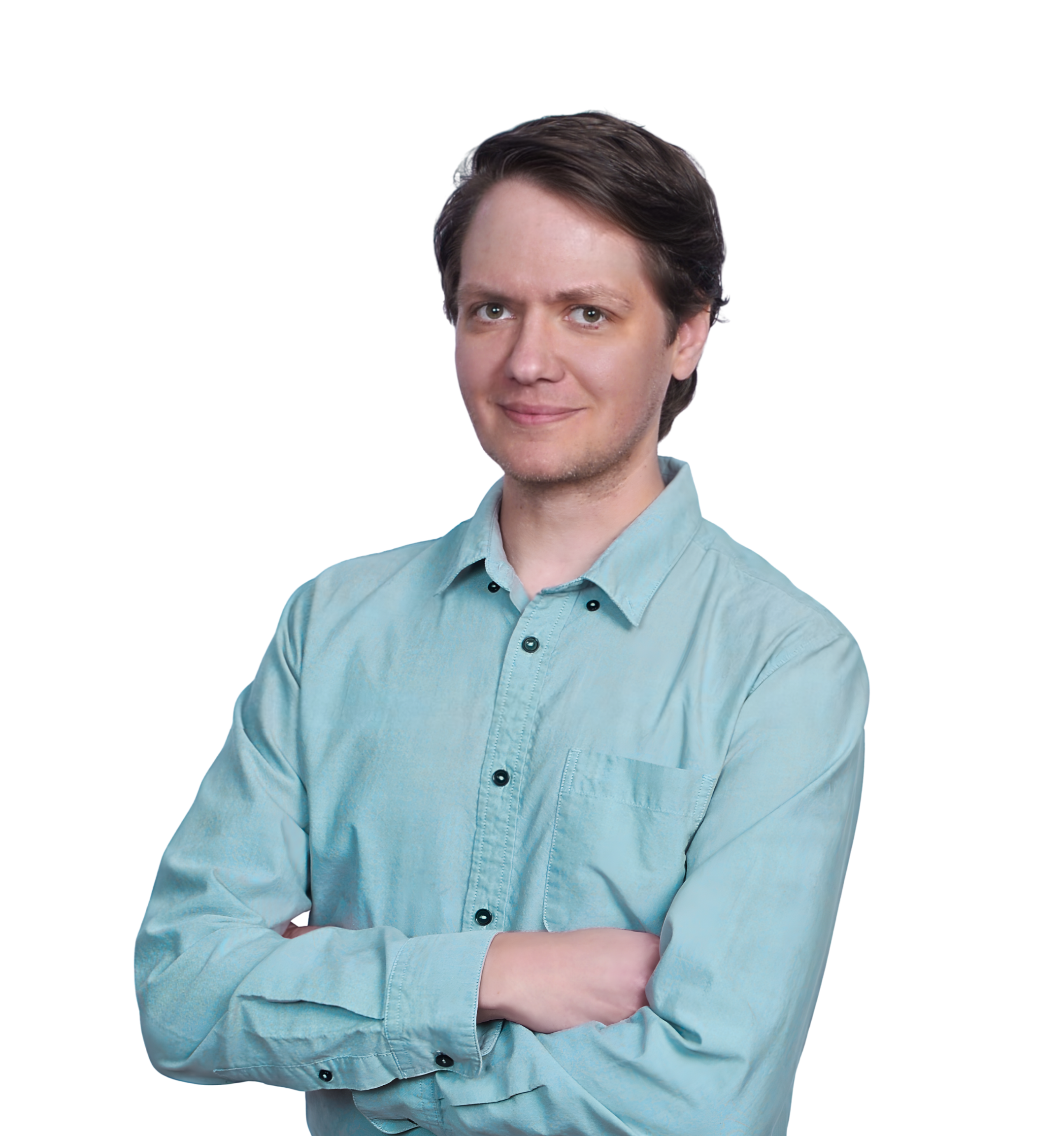 a man in a teal-colored button down shirt. His arms are folded and he's smiling.